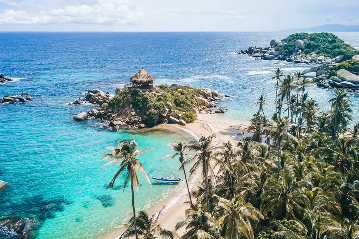 https://inmergecolombia.com/wp-content/uploads/2024/10/tour-a-cabo-san-juan-parque-tayrona.webp